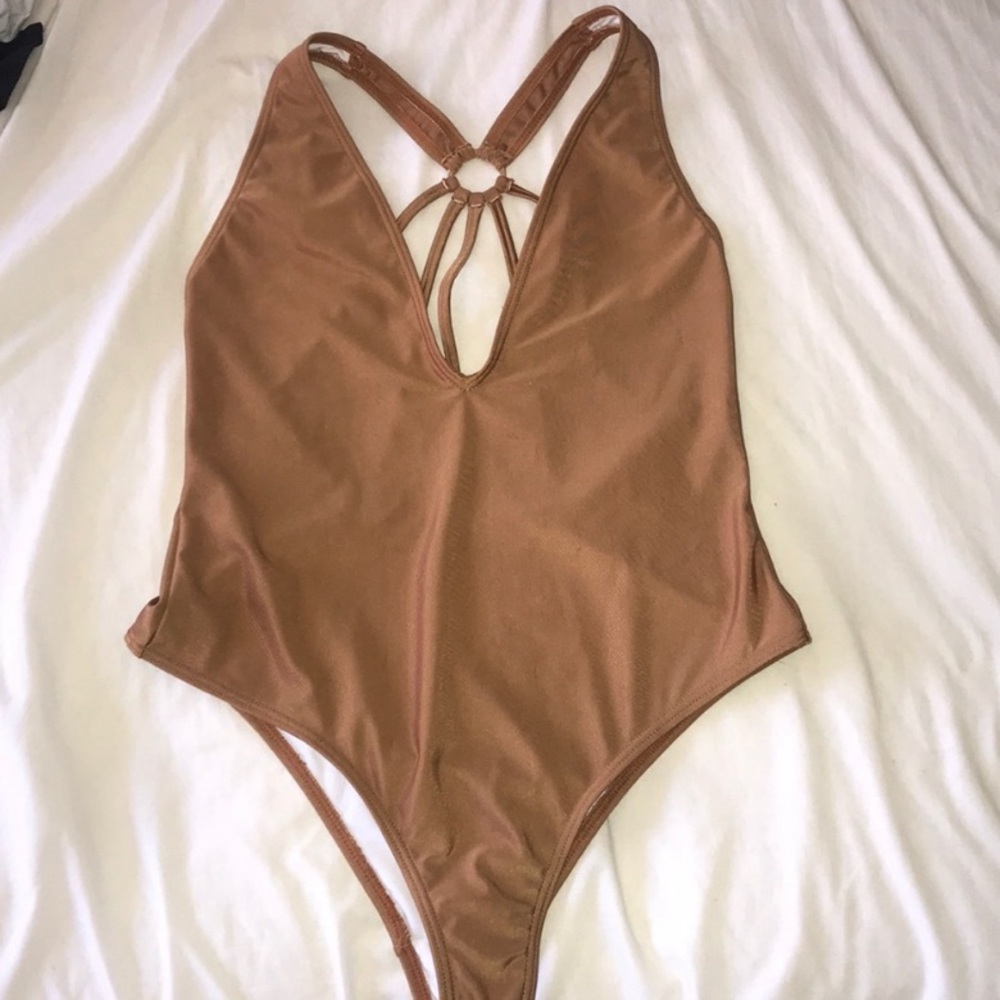 NEW!! Cupshe tan one piece bathing suit. Low cut with back design.